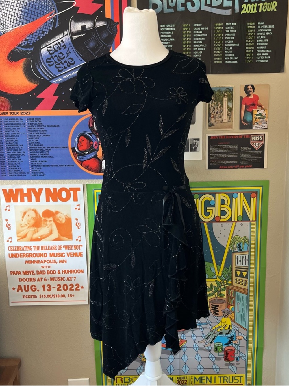 Black nylon mini dress with silver flower details and black ribbon bow
